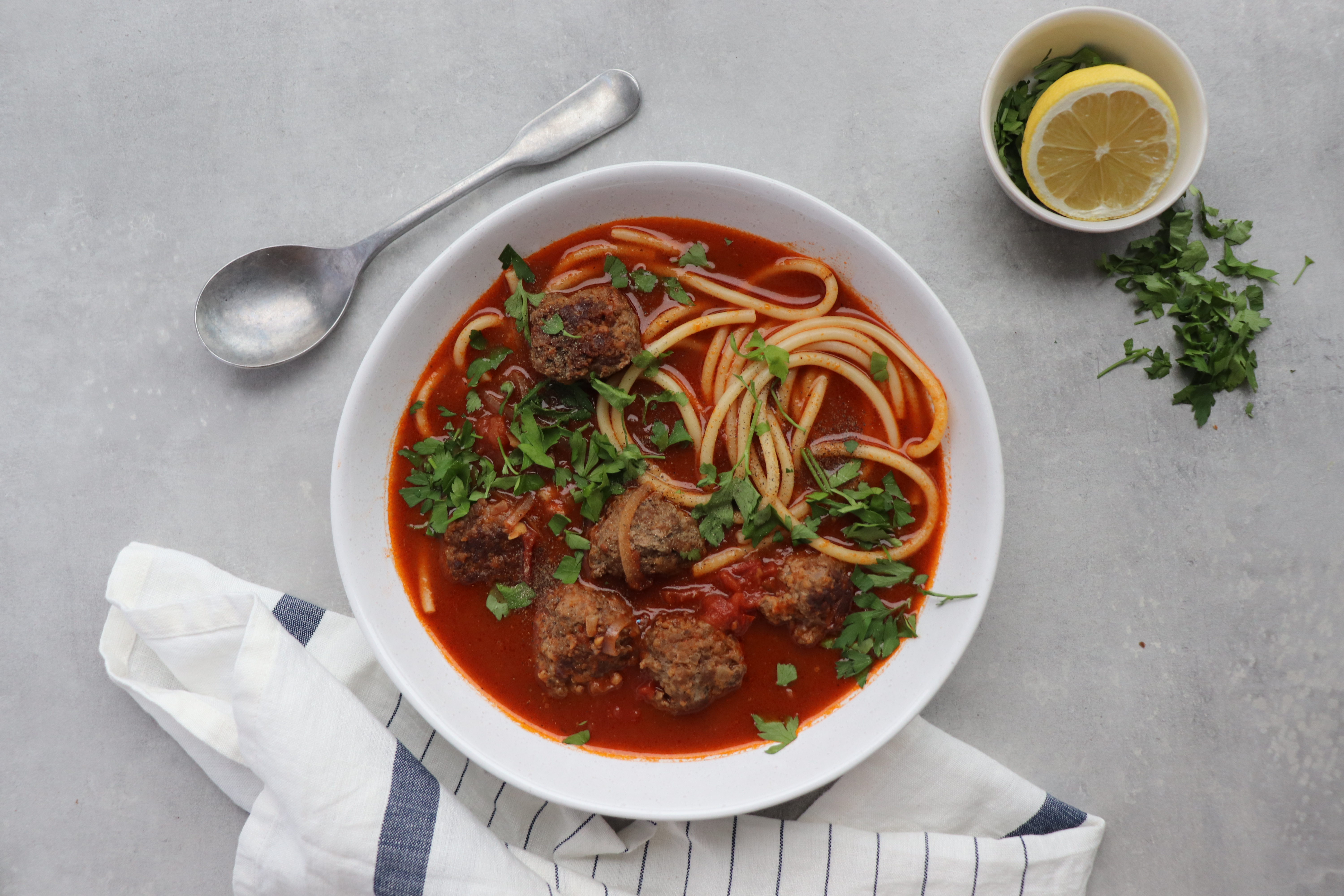 Meatball soup with spaghetti